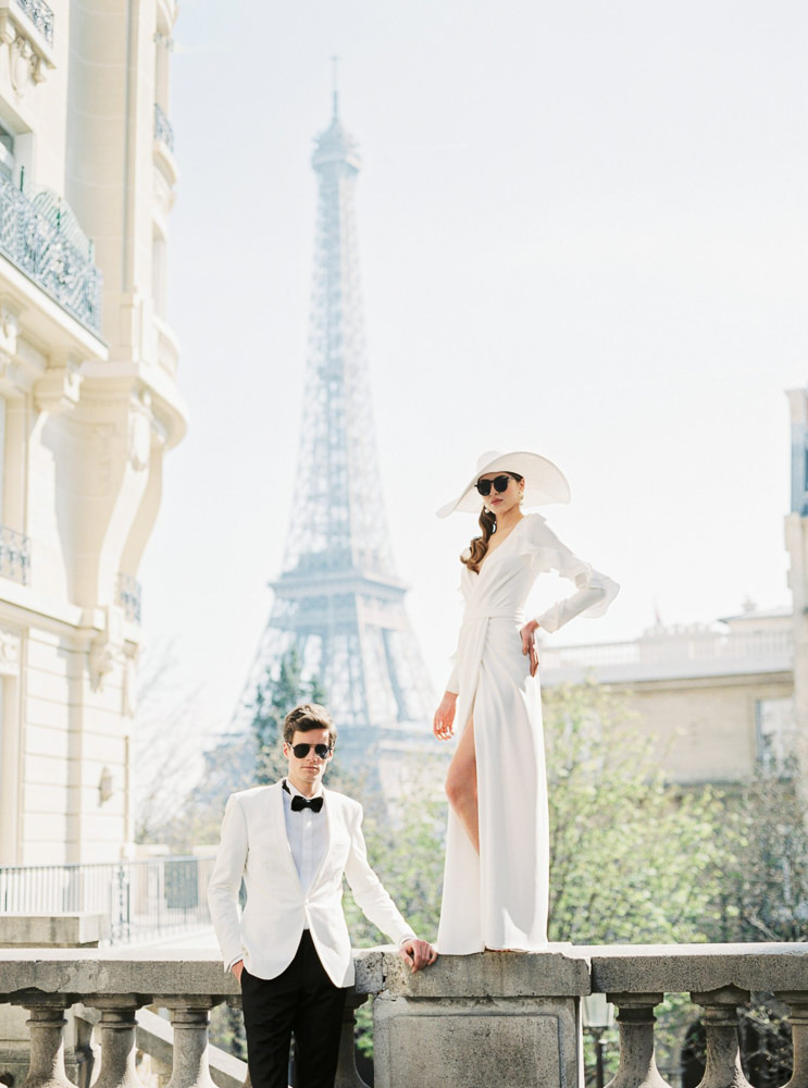 Fashionable couple posing for engagement photos before the wedding